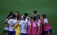 group of players on field during daytime